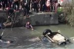 瑞安女司機(jī)倒車墜河